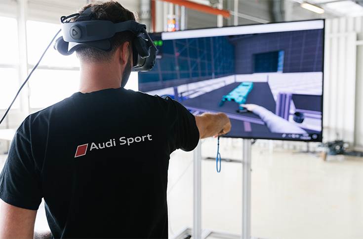 Audi employees working on the VR technology