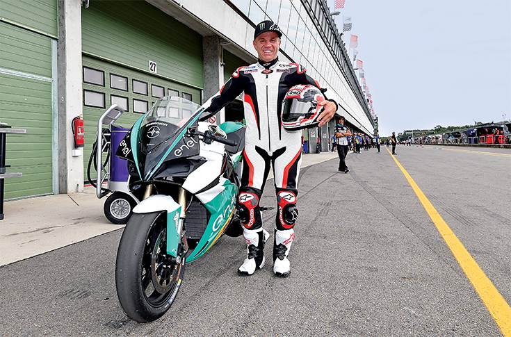 Racing legend Randy  Mamola with an Energica.