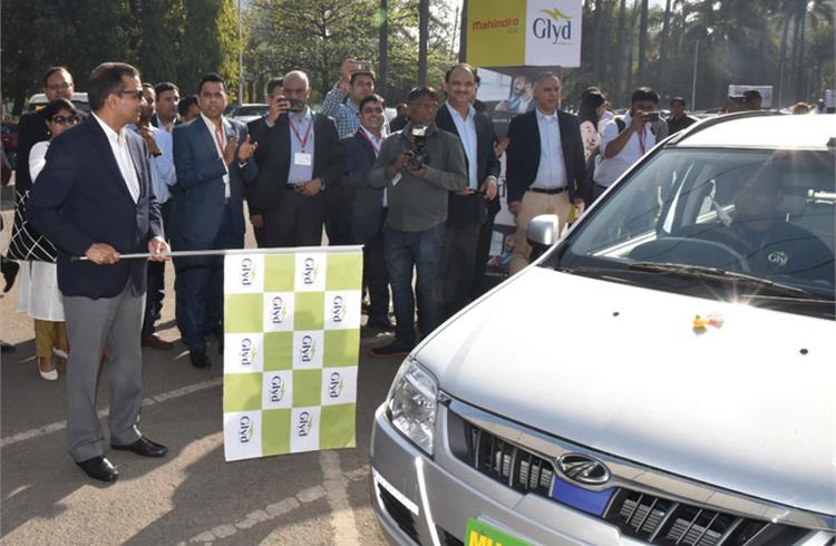 Dr Pawan Goenka, MD, Mahindra & Mahindra flagging off the Mahindra e-Verito at the launch of ‘Glyd’, a premium tech-based e-mobility service in Mumbai on select routes.