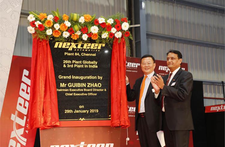 Guibin Zhao, chairman, Nexteer Automotive and Madhav Kulkarni, MD, Nexteer India, inaugurate the Chennai plant.