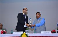 Santosh Iyer – vice president-customer services, retails training & corporate affairs, Mercedes-Benz India, being felicitated by Atul Garg, state minister of Uttar Pradesh.