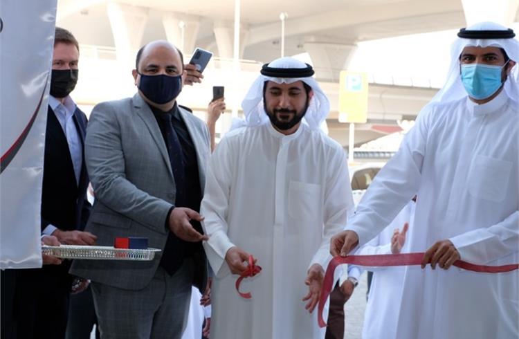 Ibrahim Al Sadah, head and managing partner, Public Motors; Ahmad Al Sadah and Amit Manawa, TVS Motor Company at the inauguration ceremony.
