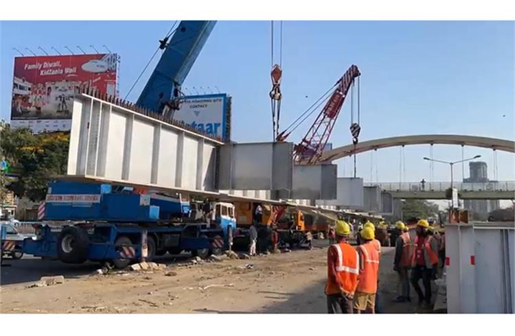 Cranes deployed to position the subway girder