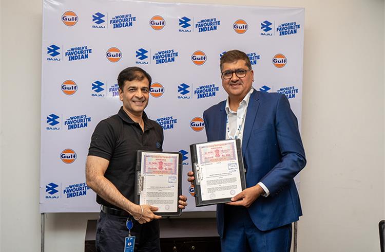 Sarang Kanade (left), president, motorcycle business unit, Bajaj Auto and Ravi Chawla, managing director, Gulf Oil Lubricants India at a ceremony held in Pune