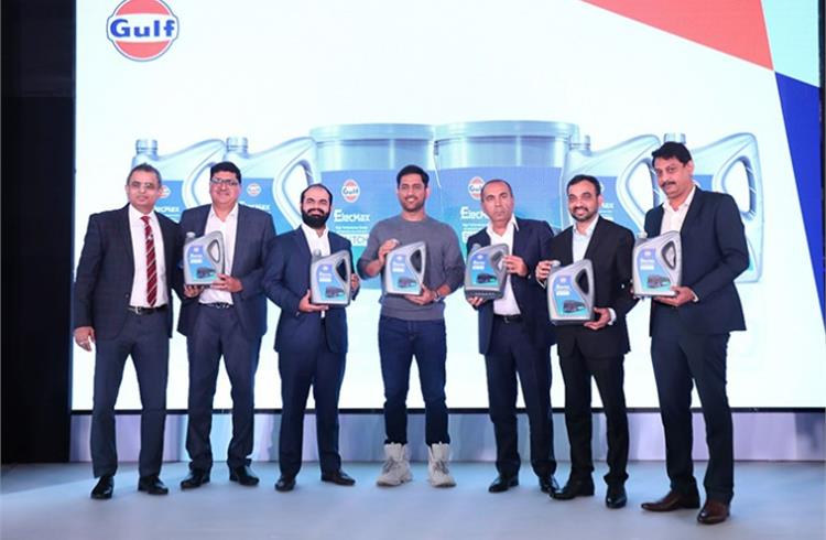 Gulf Oil chairman Sanjay Hinduja; CEO and MD Ravi Chawla and brand ambassador MS Dhoni, with the Switch Mobility team