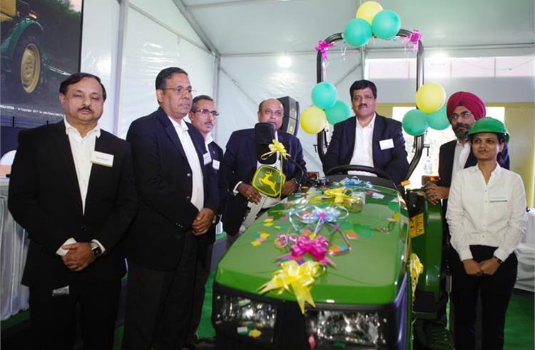 Satish Nadiger, managing Director, John Deere India, with the new four-wheel-drive 3028EN tractor.