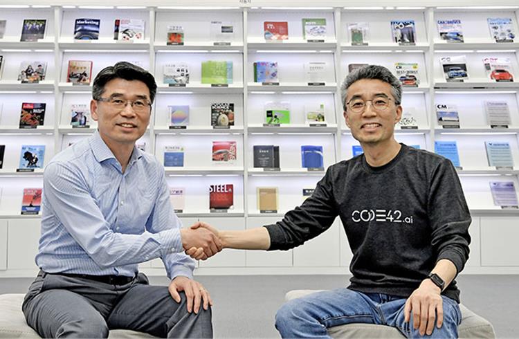 L-R: Ho Sung Song, CEO and President of Kia and Chang Song, founder and CEO of CODE42.ai who will be chairman of Purple M.