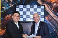 L-R: John Wang, founder and chairman, FutureMove Automotive with Warren Harris, CEO and managing director, Tata Technologies.