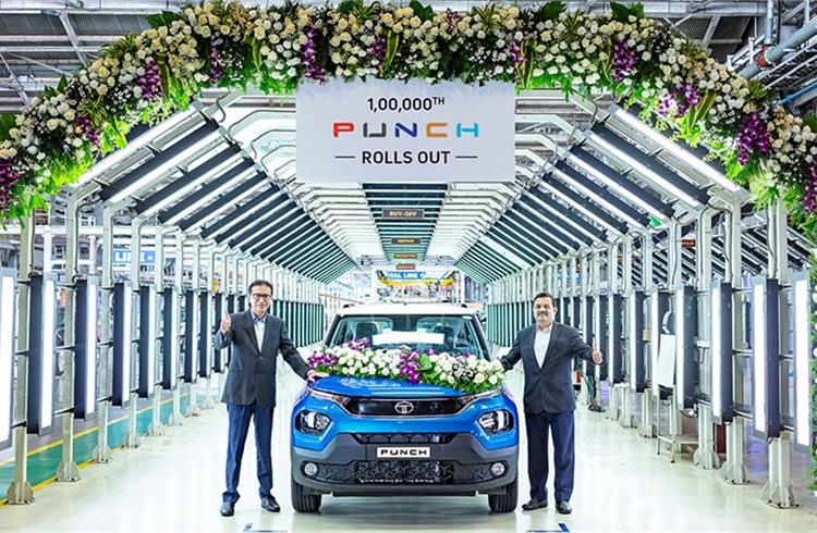 L-R: Rajesh Khatri, VP, Operations, Tata Motors Passenger Vehicles and Mohan Savarkar, vP, Product Line, Tata Motors Passenger Vehicles Ltd with the 1,00,000th unit of the Punch at Tata Motors’ plant