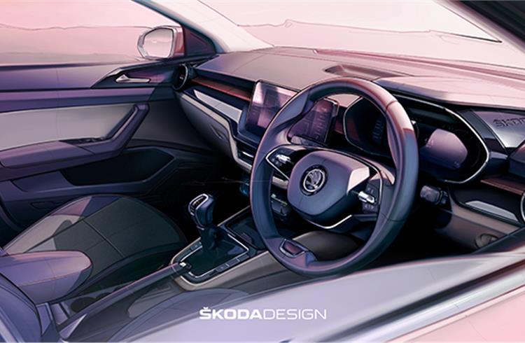 The digital instrument cluster’s display can be seen behind the two-spoke multifunction steering wheel.