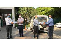 From Left: Rajiv Gandhi, Member Executive Board, Maruti Suzuki seen handing over the first batch of 200,000 units of triple-ply face masks to Amit Khatri, IAS, District Magistrate, Gurugram; Ram Natarajan, ED & CEO, Maruti Krishna Group handing them over to VS Kundu ACS Haryana and CEO,GMDA.