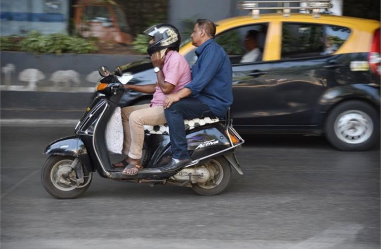 Drunken driving/ consumption of alcohol and drugs, jumping of red light and use of mobile phones (pictured here) together accounted for 6.5% of total accidents and 6.2% of total
deaths.