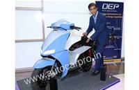 Detroit Engineered Products prototype electric scooter which has a 150km range and a maximum speed of 80kph. Also seen is Radha Krishnan, DEP founder and president.