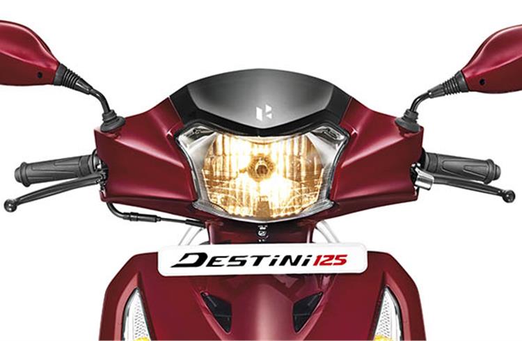 Destini 125's handlebar-mounted headlight is a conventional halogen unit and not LED-powered. 
