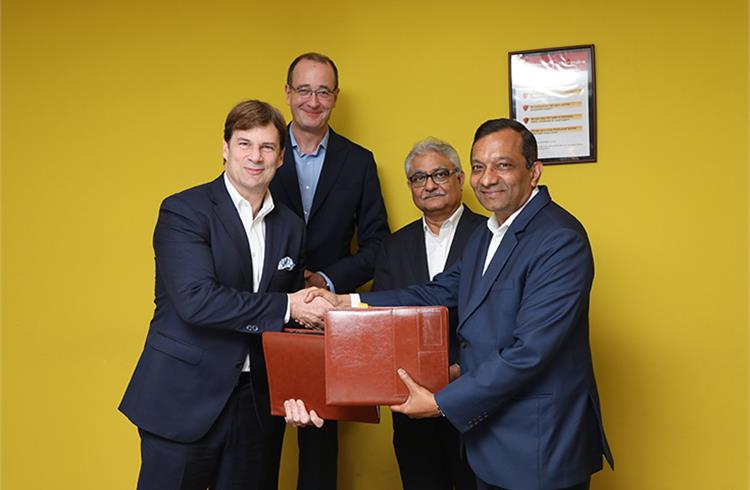 Ford and Mahindra are putting into action their MoU signed on March 22, 2018. L-R: Ford's Jim Farley and Peter Fleet, with Rajan Wadhera, president, automotive sector and Dr Pawan Goenka, MD, Mahindra