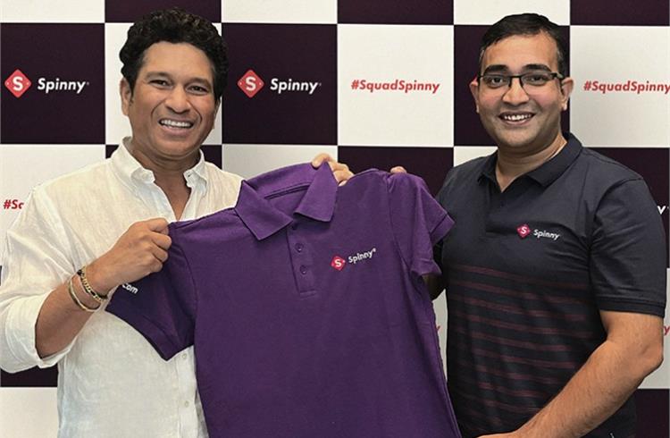 Sachin Tendulkae with Niraj Singh, founder and CEO of Spinny, the used car platform.