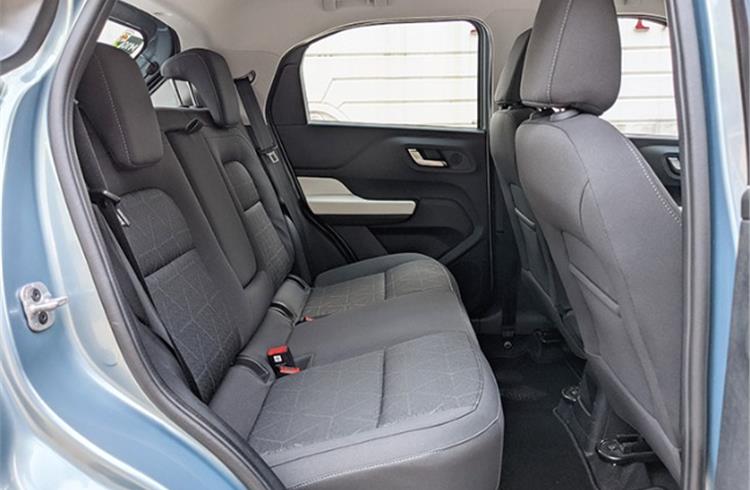 Rear seat is wide to accomodate three passengers, but offers adequate legroom, headroom and comfort.