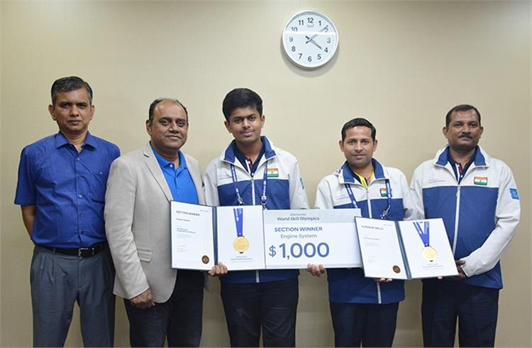 S Punnaivanam, Hyundai Motor India's VP and National Head for Aftersales, (second from left), felicitating the winners Sanchit and Ram Padarth at the company's corporate office in New Delhi.