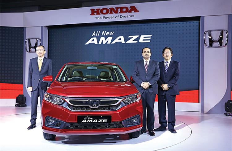 L-R: Gaku Nakanishi, president and CEO, Honda Cars India; Rajesh Goel, senior VP and director, (Marketing & Sales) and Hiroshi Yamaguchi, large project leader, second-generation Amaze.
