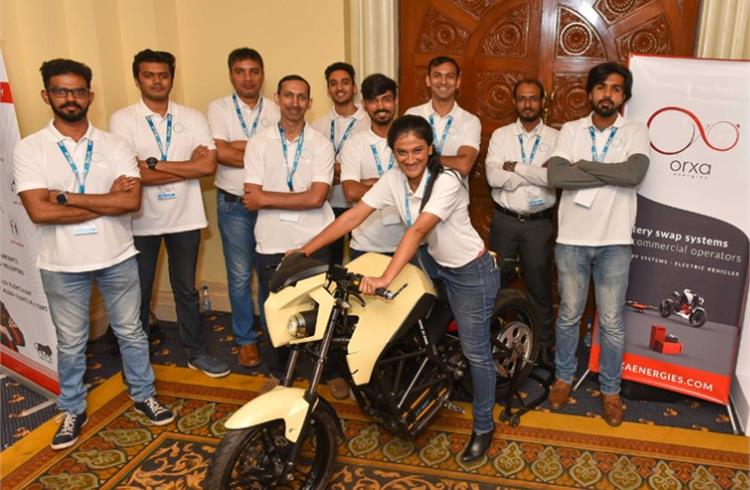 Orxa Energies' founders Ranjita Ravi (on the Mantis), Prajwal Sabnis and Amrudesh Santhanam along with the team that developed the Mantis electric motorcycle.