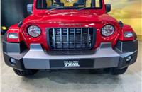 The new Mahindra Thar retains the instantly recognisable shape of its predecessor, along with signaturedesign cues – circular headlights, a seven-slot grille, chunky wheels and boxy tail-lights.