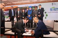 L-R: USGC chairman Josh Miller and SIAM President Vinod Aggarwal sign the MoU at the Auto Expo 2023 on January 13.