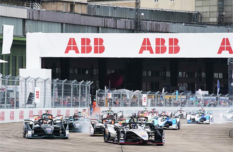 A fleet of fully electric Formula E cars jostling for position out on track. A full grid of 24 cars is expected to go toe-to-toe in Season 6.
