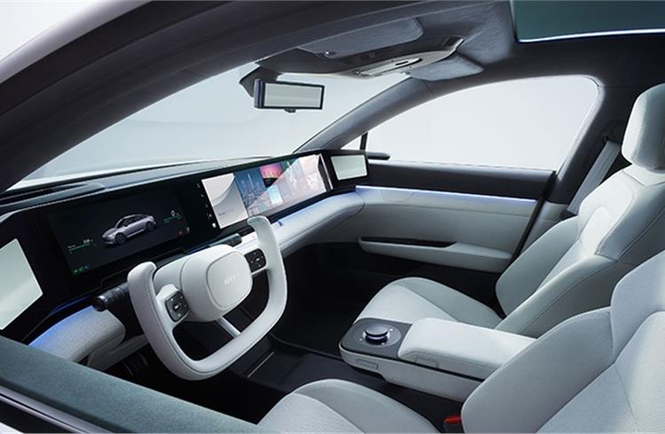 Enough space for five occupants, who sit beneath a large panoramic roof in a “cocoon-like atmosphere”, while digital screens are positioned on the back of each seat and across the dashboard.