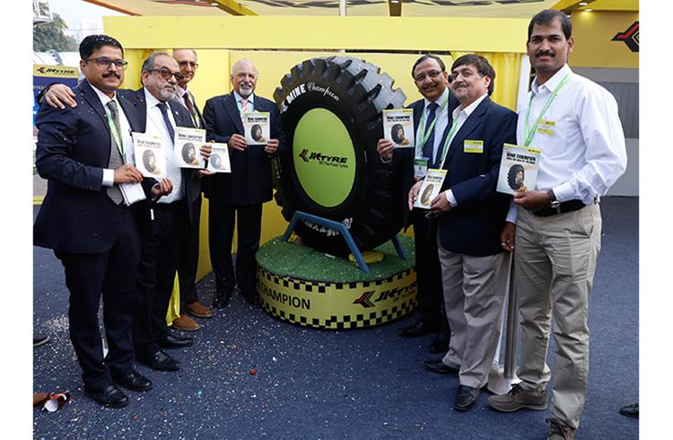 Rajiv Prasad (3rd from right), President- India Operations, JK Tyre & Industries, and members of JK management launched the Mine Champion E4/L4 OTR tyre at bauma CONEXPO INDIA 2018