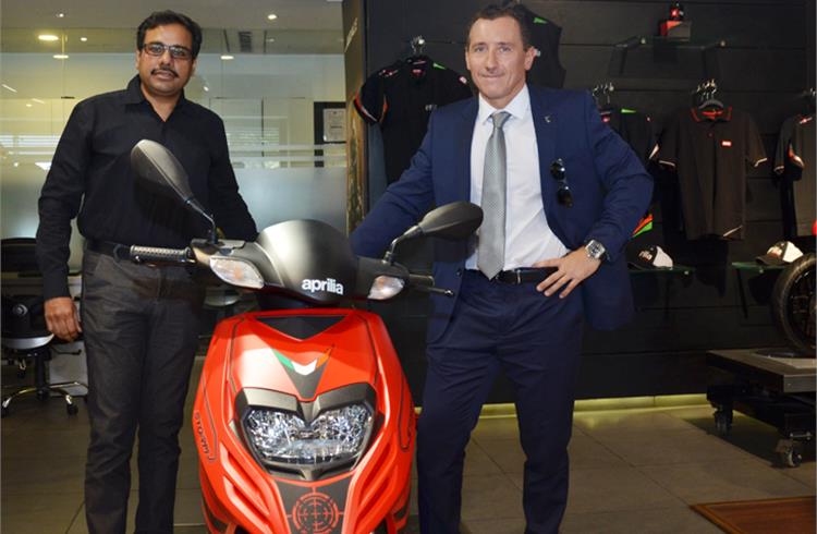 L-R: Ashish Yakhmi, head of the two-wheeler business, and Diego Graffi, MD and CEO, Aprilia India, with the new Aprilia Storm 125.