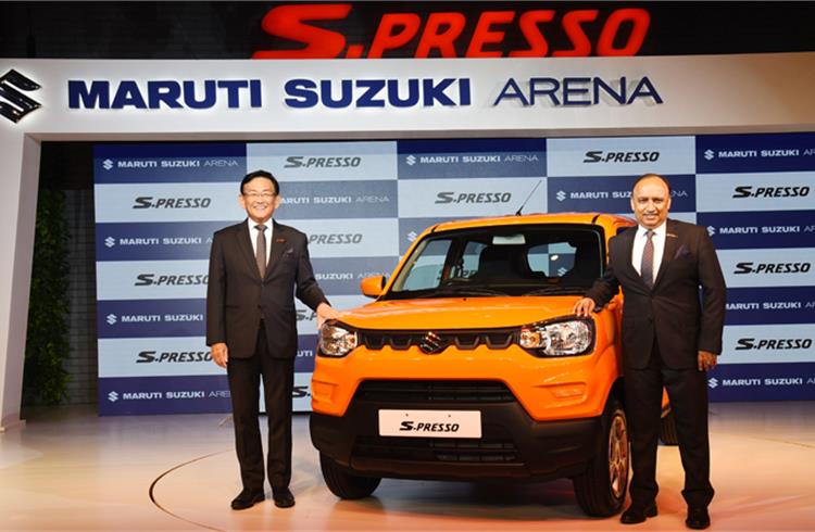 Kenichi Ayukawa, MD AND CEO, Maruti Suzuki India and Shashank Srivastava, Executive Director (Marketing & Sales), Maruti Suzuki India unveil the S-Presso in New Delhi.