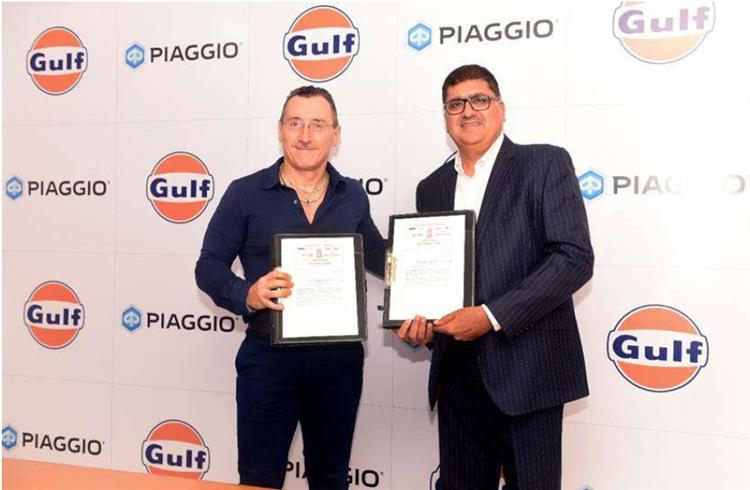Diego Graffi, CEO and MD, Piaggio Vehicles and Ravi Chawla, MD, Gulf Oil Lubricants India announcing the partnership for co-branded lubricants for commercial vehicles.