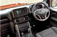 The new Mahindra Thar’s interior features a 7.0-inch touchscreen with Apple CarPlay and Android Auto, roof-mounted speakers, a colour multi-info display for the instrument cluster, steering-mounted controls and cruise control.