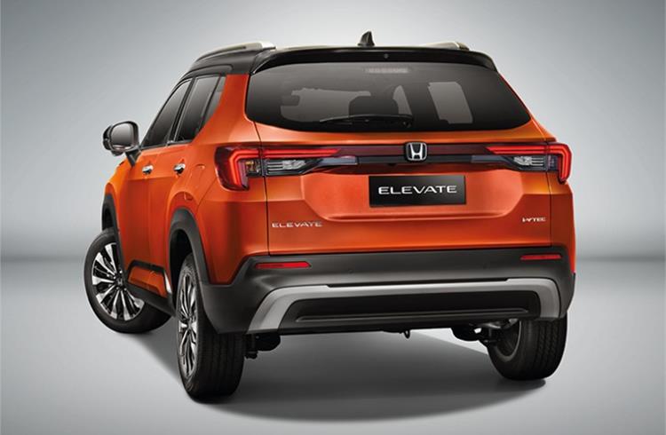 Elevate features LED tail lamps, faux skid plate, and rear defogger and wiper as part of kit.