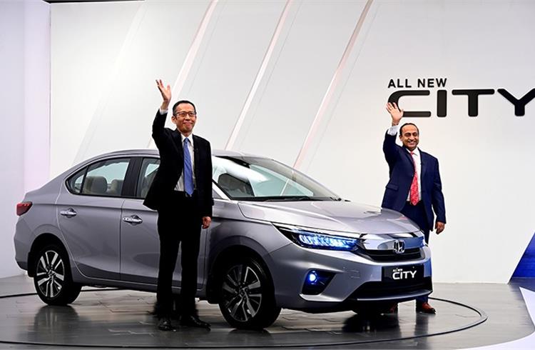 Gaku Nakanishi, President and CEO, Honda Cars India and Rajesh Goel, SVP and Director (Marketing & Sales), at the new City launch.