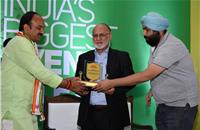 Sohinder Singh Gill, director general, SMEV and CEO, Hero Electric being awarded the EV Man of the Year Award.