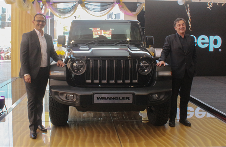L-R: Nipun J Mahajan, Head of Jeep India and Roland Bouchara, CEO and MD, Stellantis India, at the new showroom.