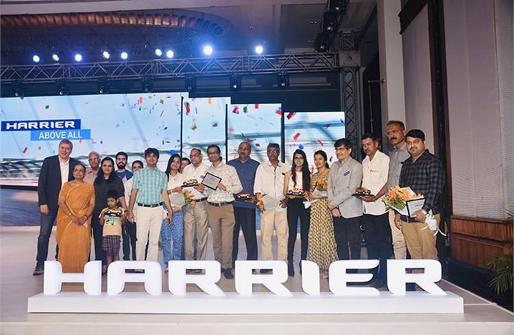 The first five customers for the Tata Harrier and their families get a photo op with CEO and MD, Guenter Butschek and sales chief Mayank Pareek