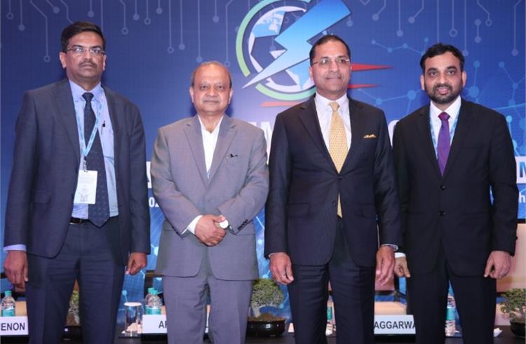 Rajesh Menon, DG, SIAM; Vinod Aggarwal, treasurer, SIAM and MD & CEO, VE Commercial Vehicles; Arun Goel, secretary, MoRTH; Mahesh Babu, chairman, SIAM Electric Mobility Group & CEO, Mahindra Electric.