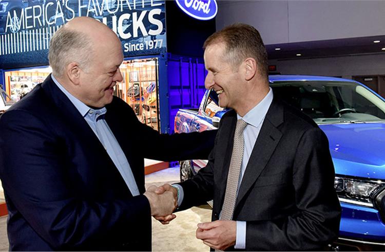 Volkswagen CEO Dr. Herbert Diess (right) and Ford CEO Jim Hackett confirmed that the companies plan to develop commercial vans and medium-sized pickups for global markets from 2022.