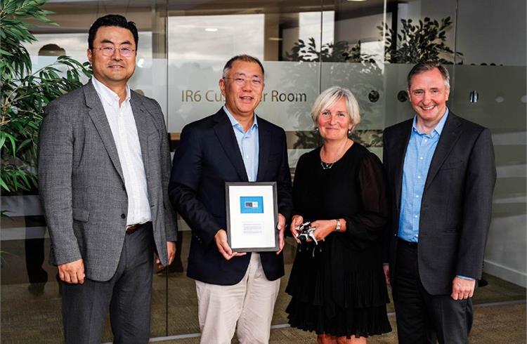 (From left) Heungsoo Kim, VP, Hyundai Motor Company; Chung Eui-sun, Chairman of Hyundai Motor Group; Ann-Marie Holmes, joint VP, Intel Semiconductor Manufacturing Group, and Neil Philip, VP, Intel Fab24 Operations, Ireland.