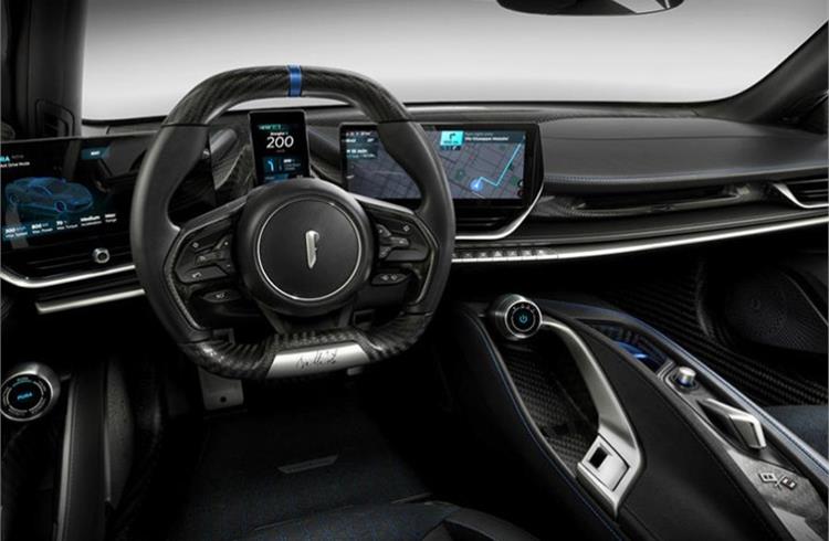 They include a more ergonomic steering wheel made taller and narrower as well as a relocated charging port surrounded by LED lights.