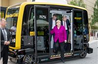 Continental CEO Dr. Elmar Degenhart, German Chancellor Angela Merkel and VDA president Bernhard Mattes in the Robo-Taxi