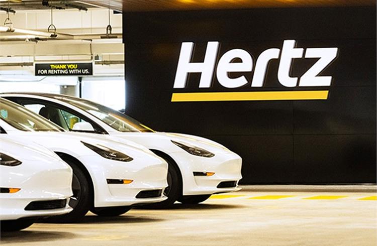 Tesla Model 3 electric vehicles at a Hertz airport location. (Photo by ER Davidson)