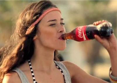 Coke pushes positivity, welcomes 2014