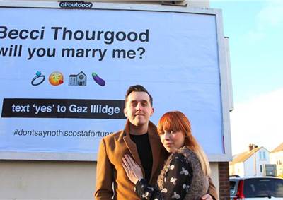 Tuesday Morning Gloom Buster: Man rents billboard to propose to girlfriend