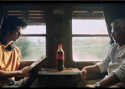 Coke's 'share' series now sees a father become a friend