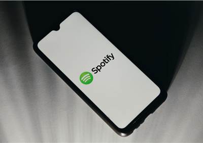 Spotify beats Q4 subscriber projections but prepares to further rein in spend