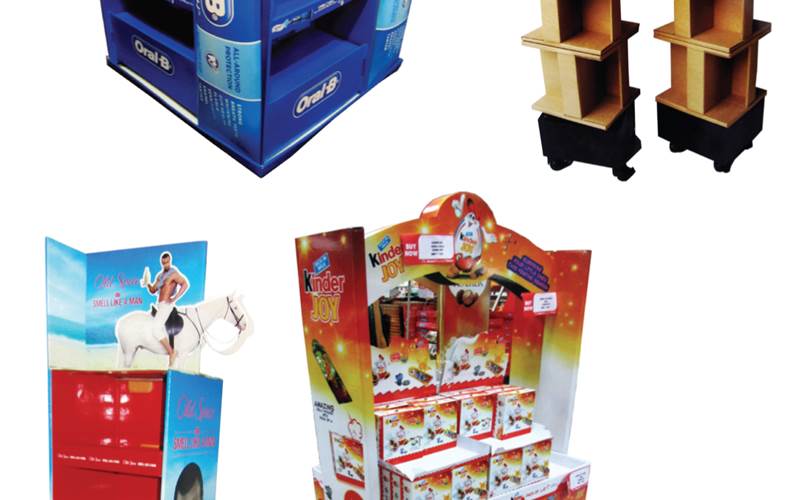 PrintWeek India Point-Of-Purchase Printer of the Year 2013 - Jayna Packaging. Kinder Joy Arch display, Old Spice standing unit, Oral B island display and Rubber Band floor standing unit. All the entries were made from 100% recyclable heavy duty corrugated board with five-colour printing.
          Explaining the Kinder Joy Arch, Jayna states that the client wanted to make an island display which would carry a stock of around 50kgs and be sturdy enough
