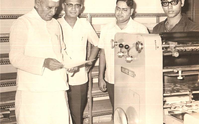 The second generation of the Marathe family, Sureshbhau Marathe (second from the right) showing the Swifts 150 to a leading businessman of the time